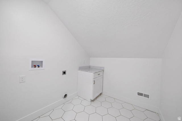 1002 West Temple Rim Lane Payson, UT 84651 - Photo 41 of 68 Utility area with hexagonal tile flooring and white baseboards