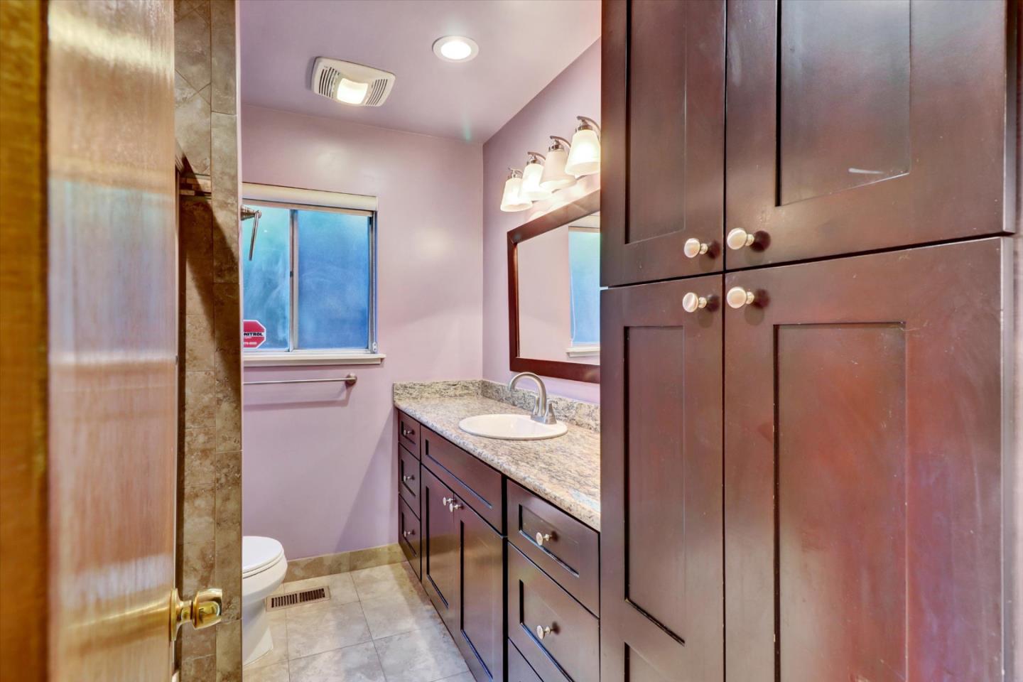 331 David Avenue Campbell, CA 95008 - Photo 12 of 32 a bathroom with a sink a toilet and shower