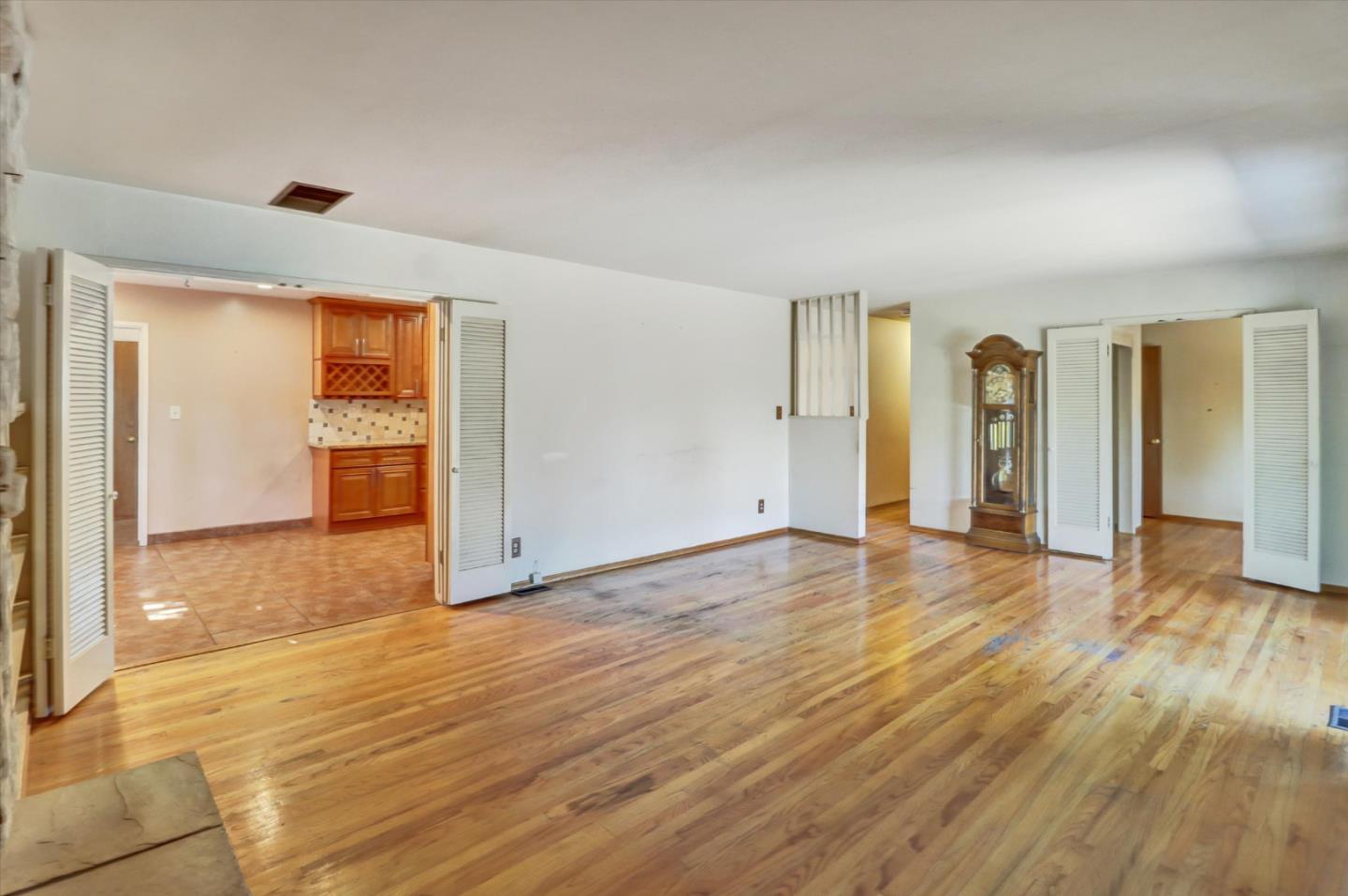 331 David Avenue Campbell, CA 95008 - Photo 23 of 32 wooden floor in an empty room with a window