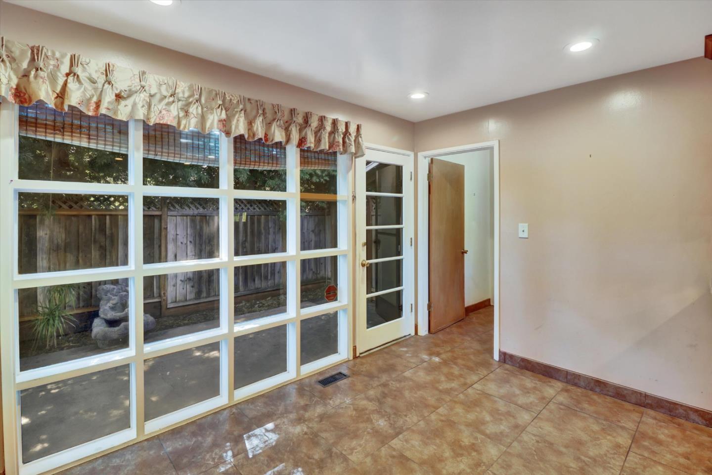 331 David Avenue Campbell, CA 95008 - Photo 25 of 32 a view of an empty room with a window and cabinet
