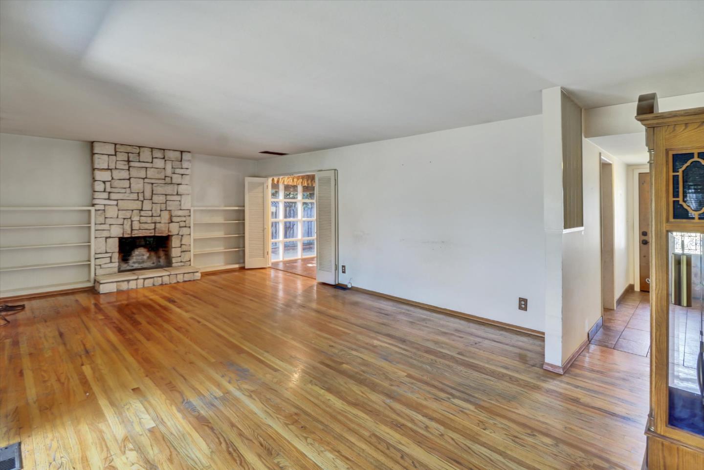 331 David Avenue Campbell, CA 95008 - Photo 3 of 32 wooden floor fireplace and natural light in room