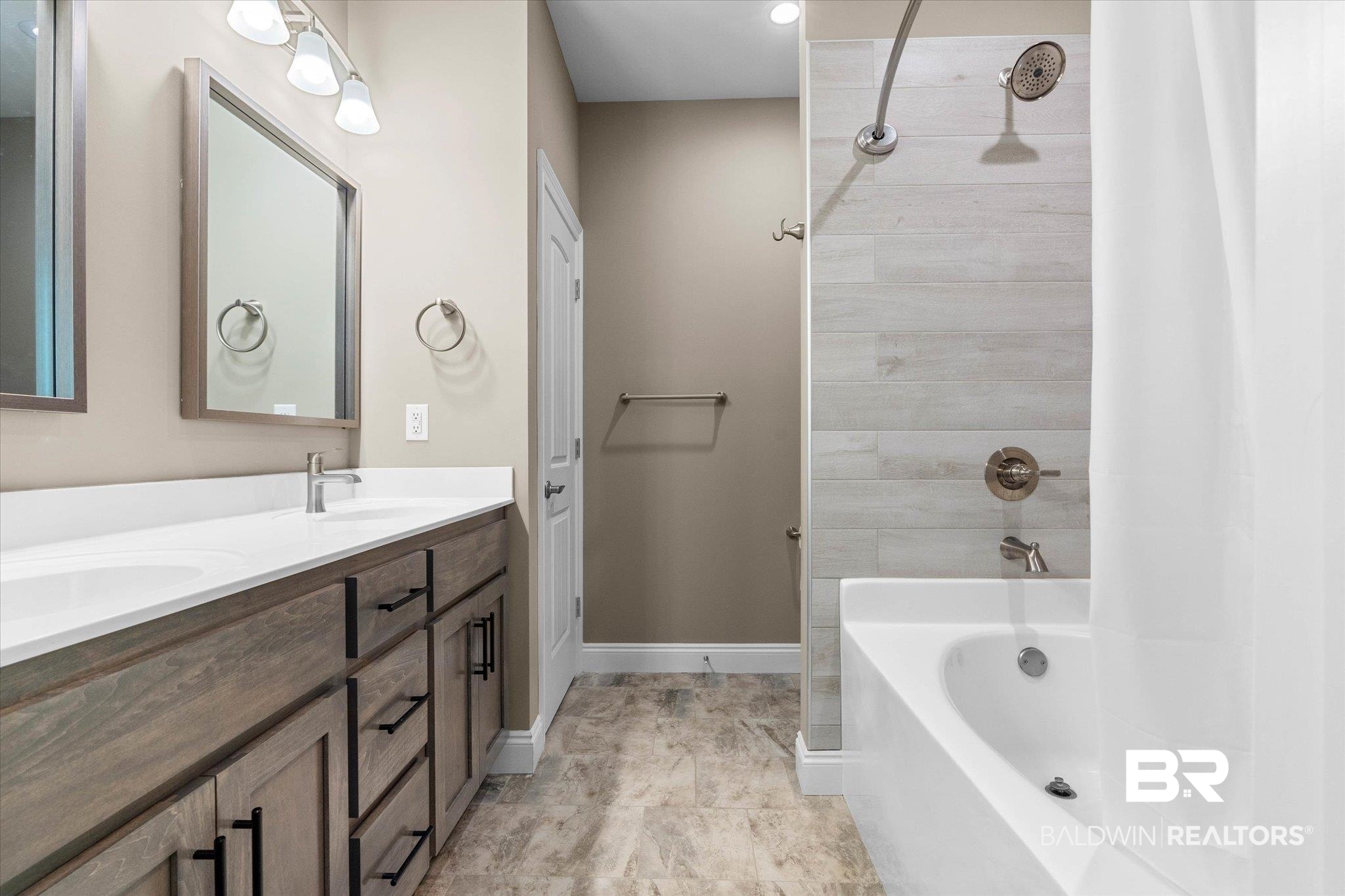 1101 Pinemont Drive Mobile, AL 36609 - Photo 11 of 18 Full bathroom with a shower, double vanity, a tub, and a sink