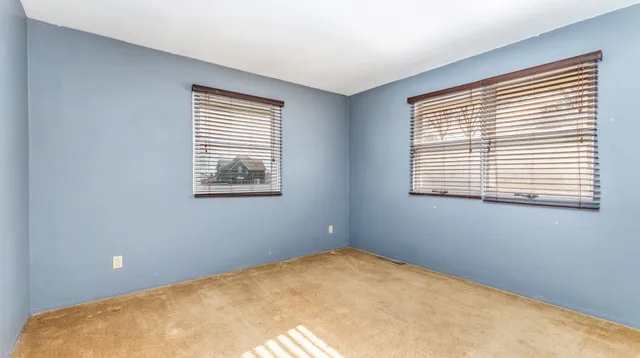 a view of a room with a large window