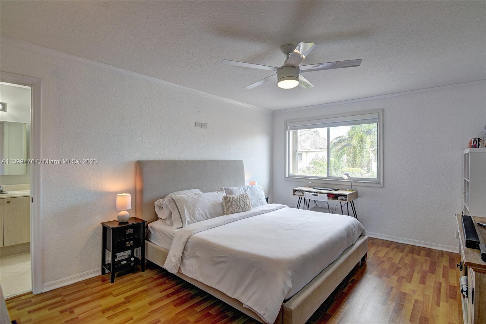 471 Fishtail Terrace Weston, FL 33327 - Photo 15 of 33 a bedroom with a bed and window