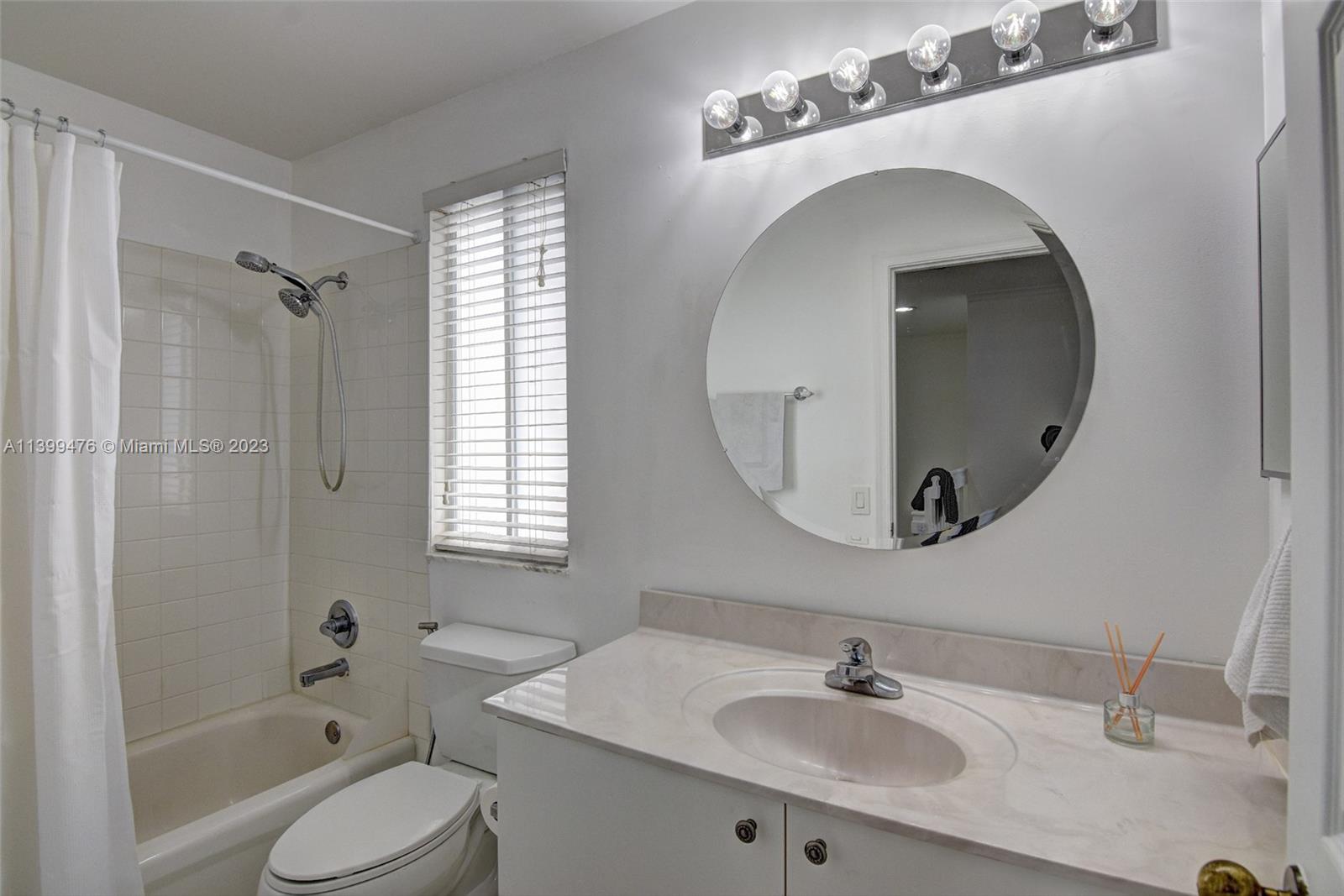 471 Fishtail Terrace Weston, FL 33327 - Photo 24 of 33 a bathroom with a sink toilet and shower