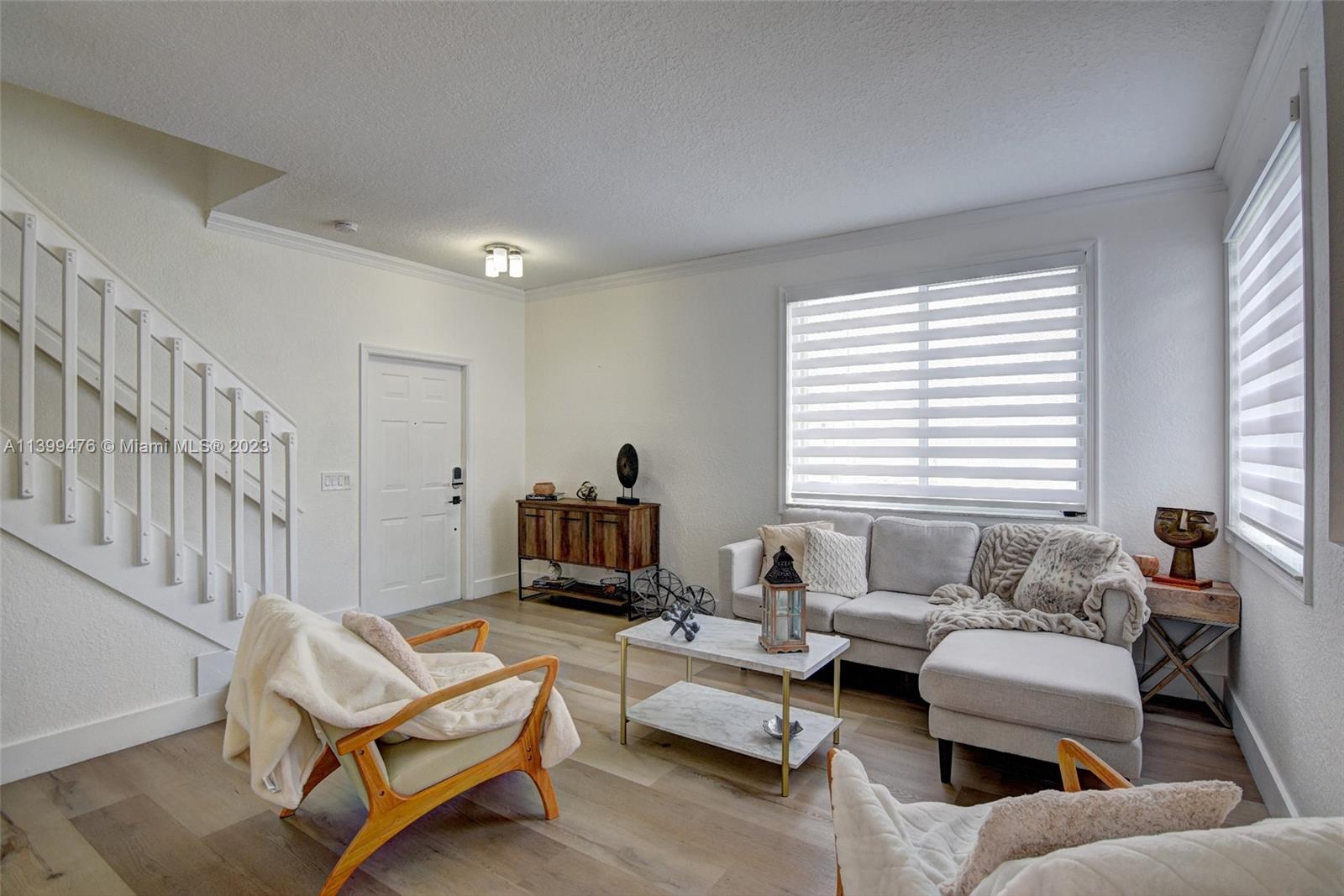 471 Fishtail Terrace Weston, FL 33327 - Photo 3 of 33 a living room with furniture and a window