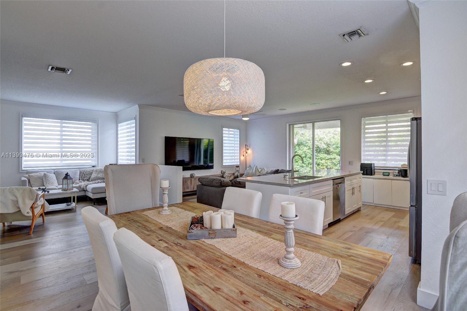 471 Fishtail Terrace Weston, FL 33327 - Photo 8 of 33 a living room with furniture and a large window