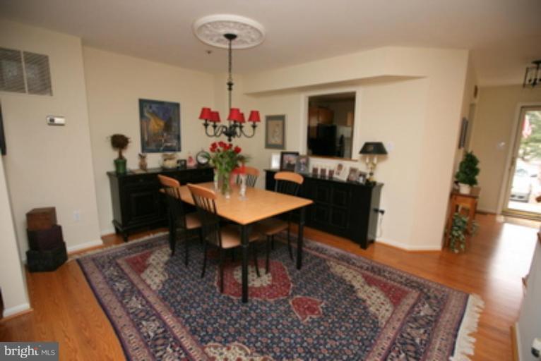 3323 Sea Port Way Silver Spring, MD 20902 - Photo 7 of 29 a view of a dining room with furniture
