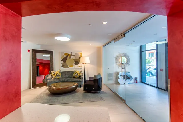 a living room with furniture and a window