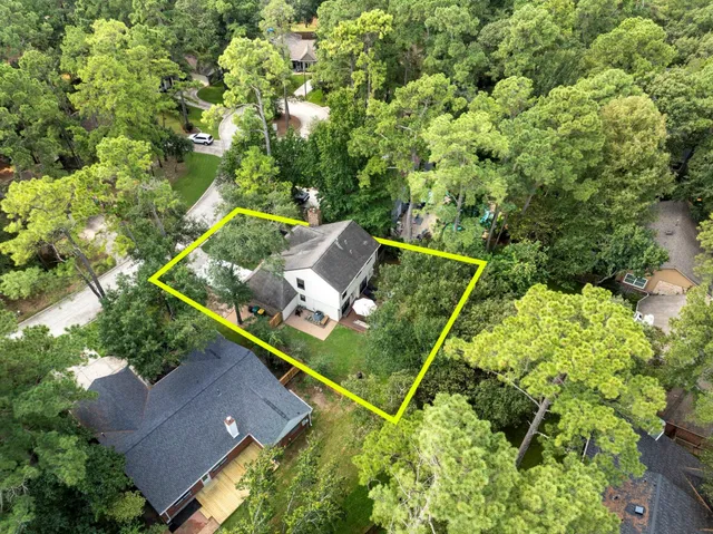 an aerial view of a backyard