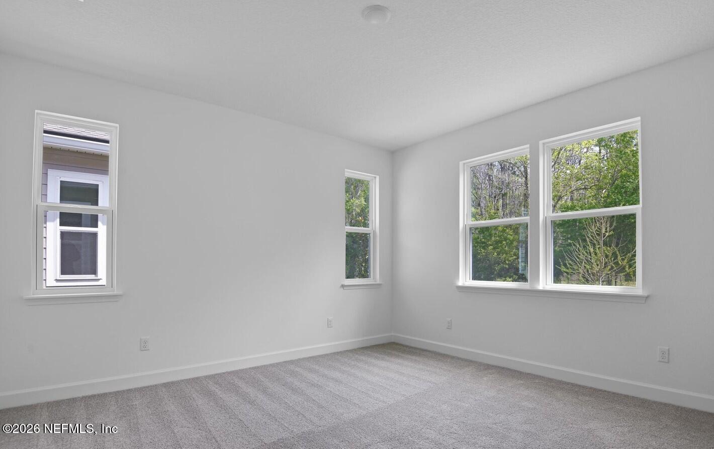 434 Cedar Elm Way St. Augustine, FL 32092 - Photo 14 of 27 an empty room with a window