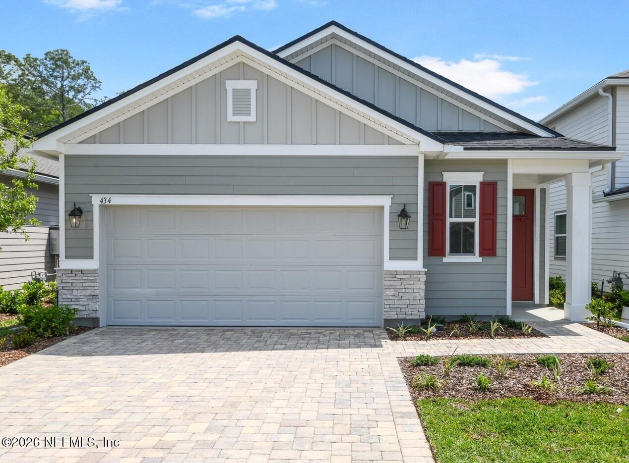 434 Cedar Elm Way St. Augustine, FL 32092 - Photo 2 of 27 a front view of a house with a yard