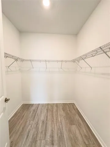 a view of a room with racks on the wall