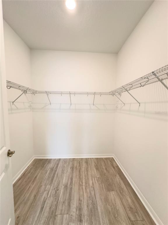 17937 Cherished Loop Lakewood Ranch, FL 34211 - Photo 17 of 30 a view of a room with racks on the wall