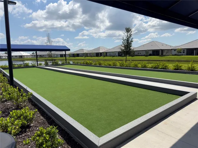 a view of swimming pool from a balcony