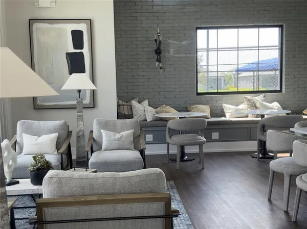 a living room with furniture and a window