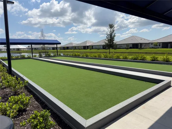 a view of swimming pool from a balcony