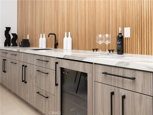 a living room with table and gym equipment