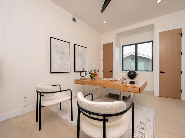 a bathroom with a toilet and a sink