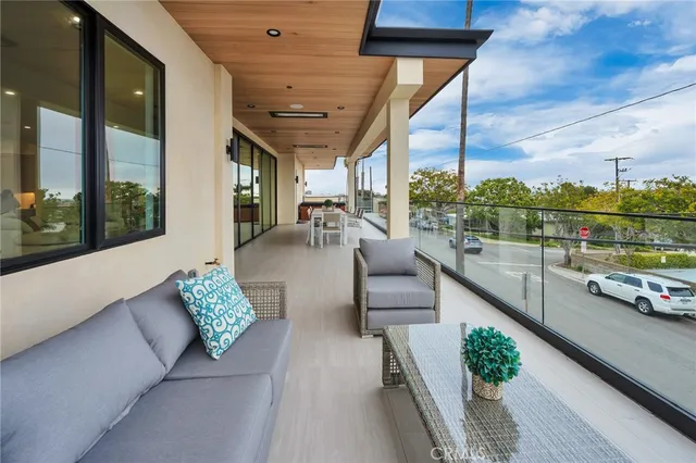 a view of backyard with patio