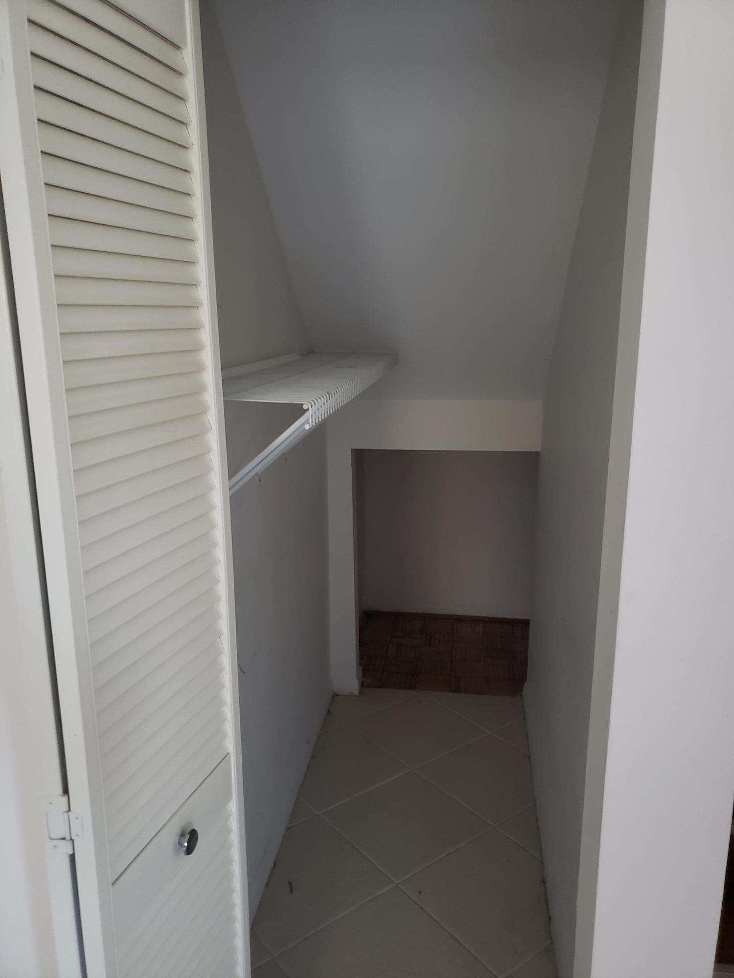 7494 Courtyard Run East Boca Raton, FL 33433 - Photo 4 of 11 Storage under Staircase