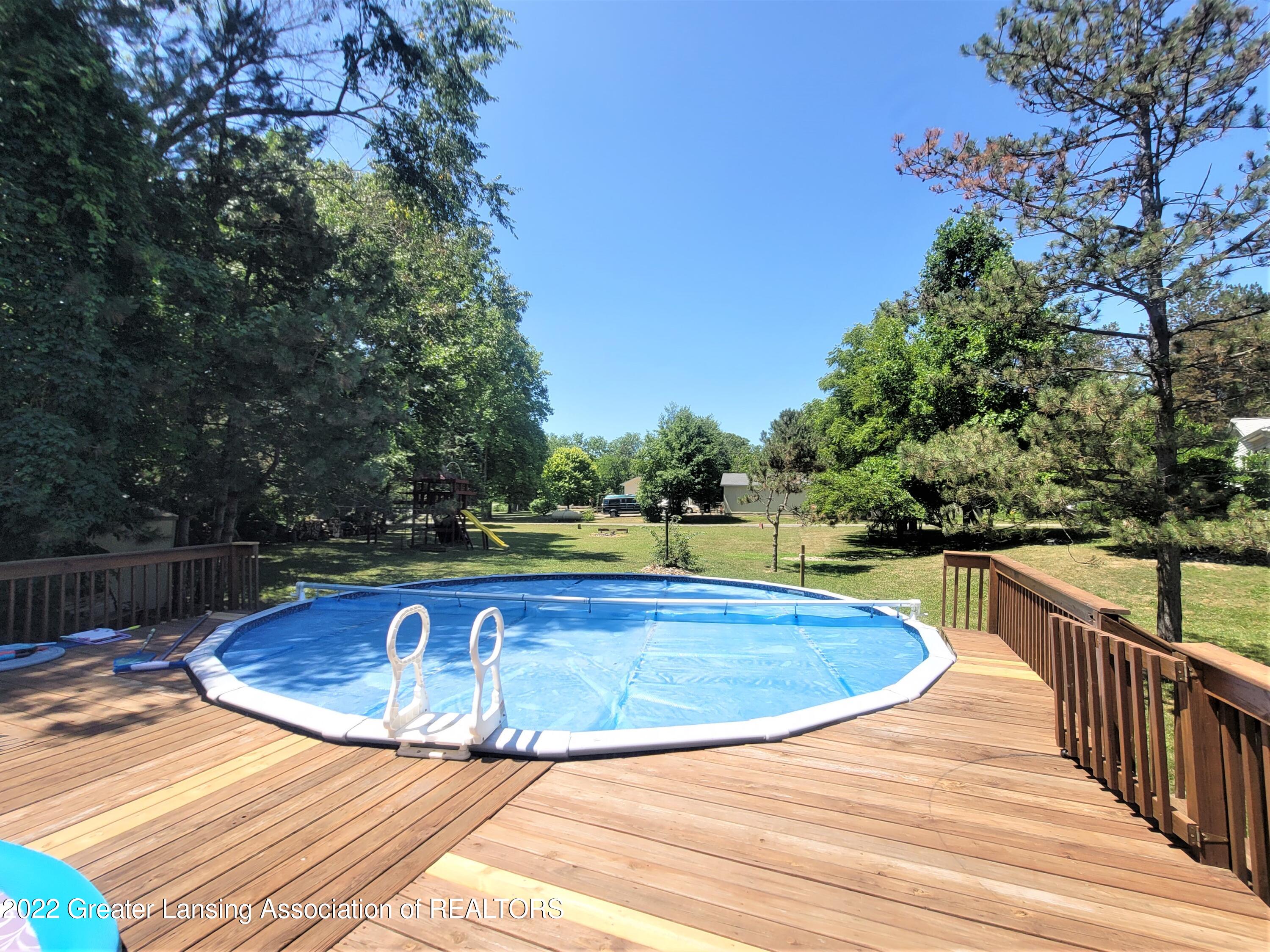 667 Lansing Road Morrice, MI 48857 - Photo 9 of 28 667 E Lansing Rd pool 2