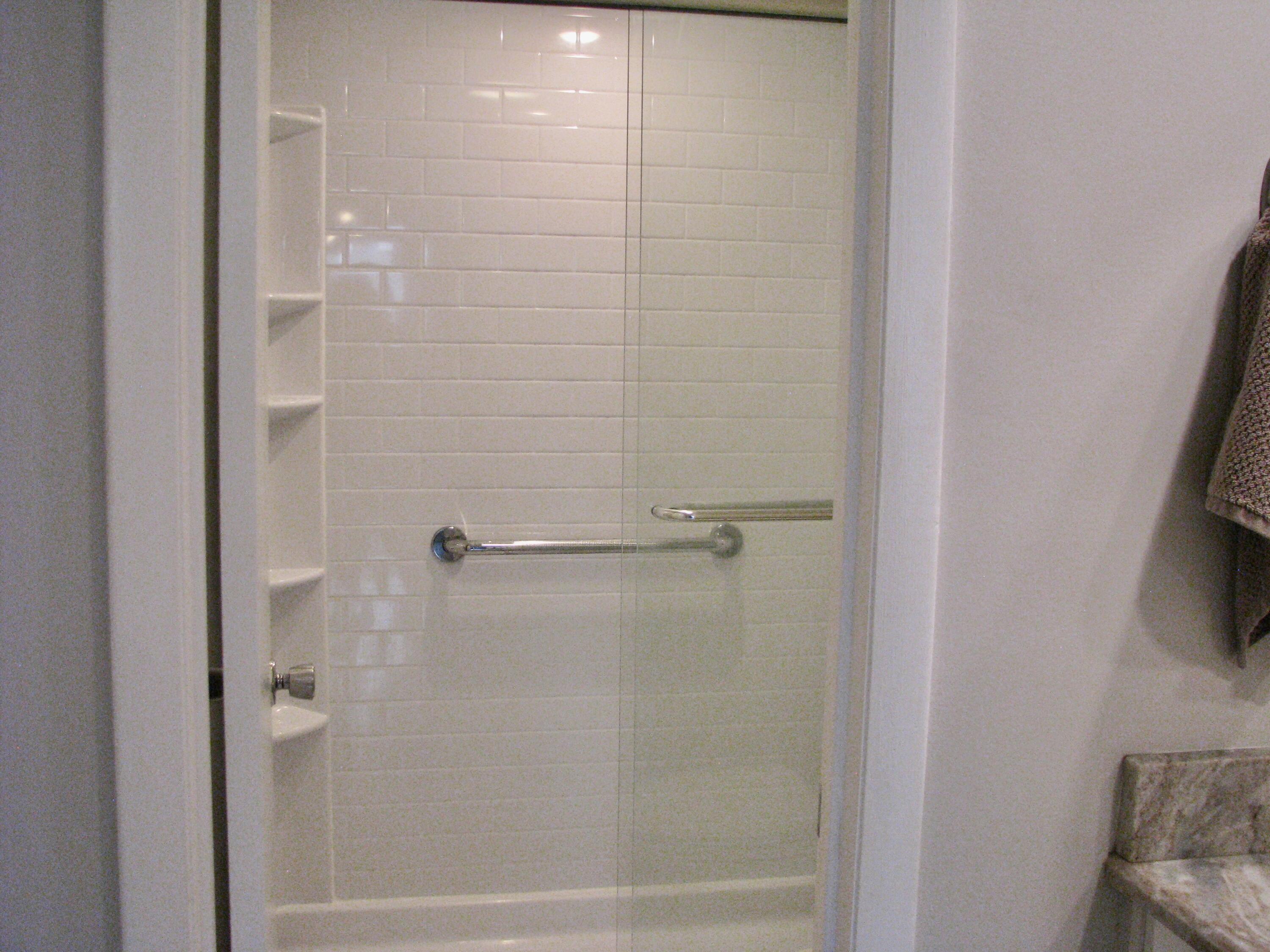 950 South Kanner Highway, Unit D4 Stuart, FL 34994 - Photo 21 of 36 a bathroom with a bathtub