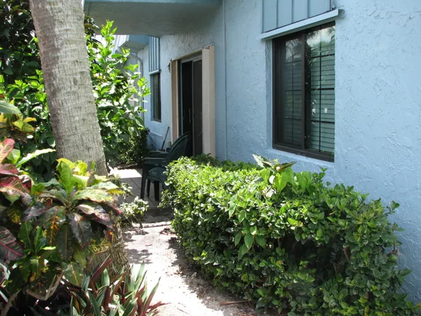 a view of entryway with flower pots