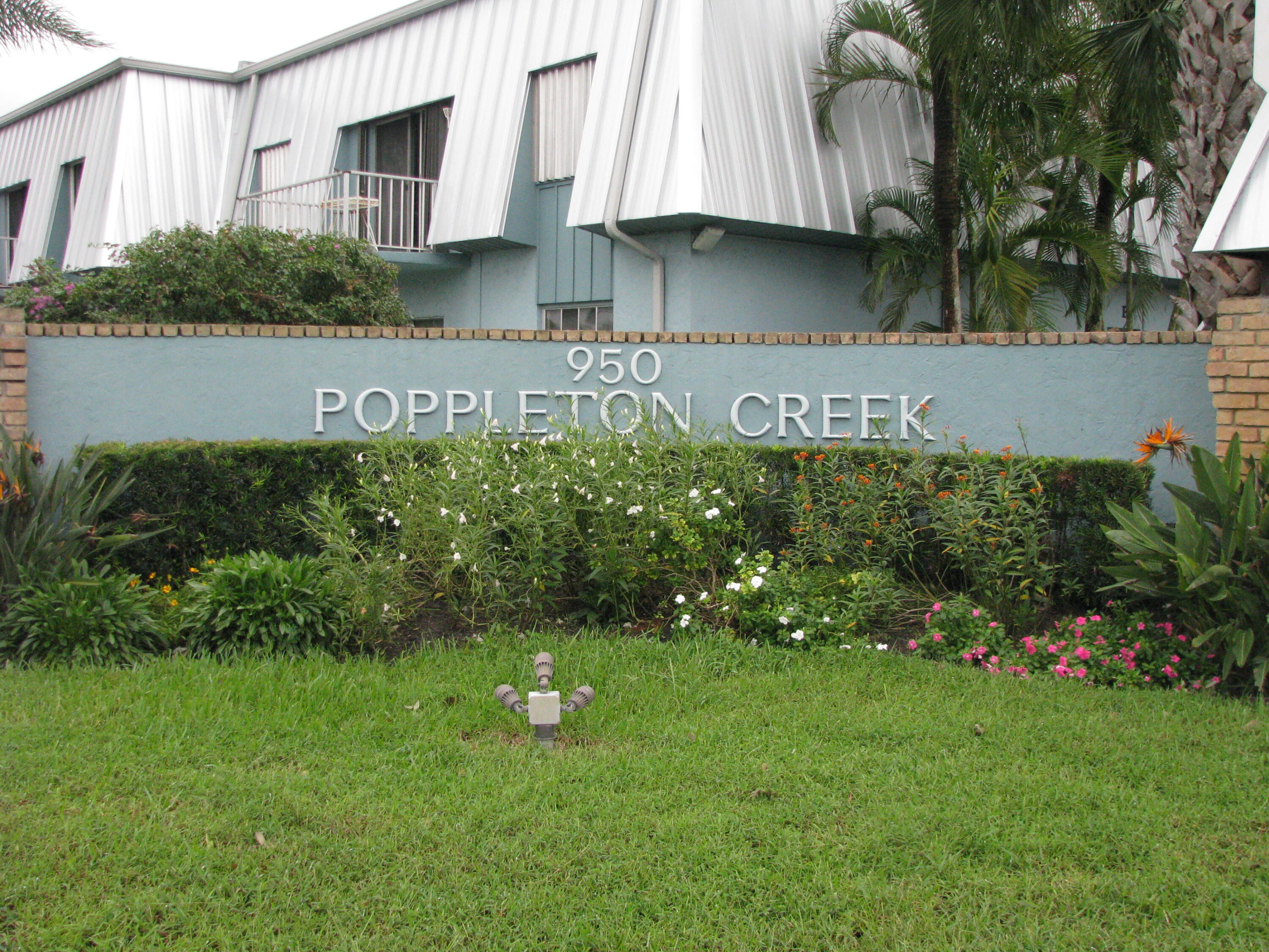 950 South Kanner Highway, Unit D4 Stuart, FL 34994 - Photo 36 of 36 a front view of a house with garden