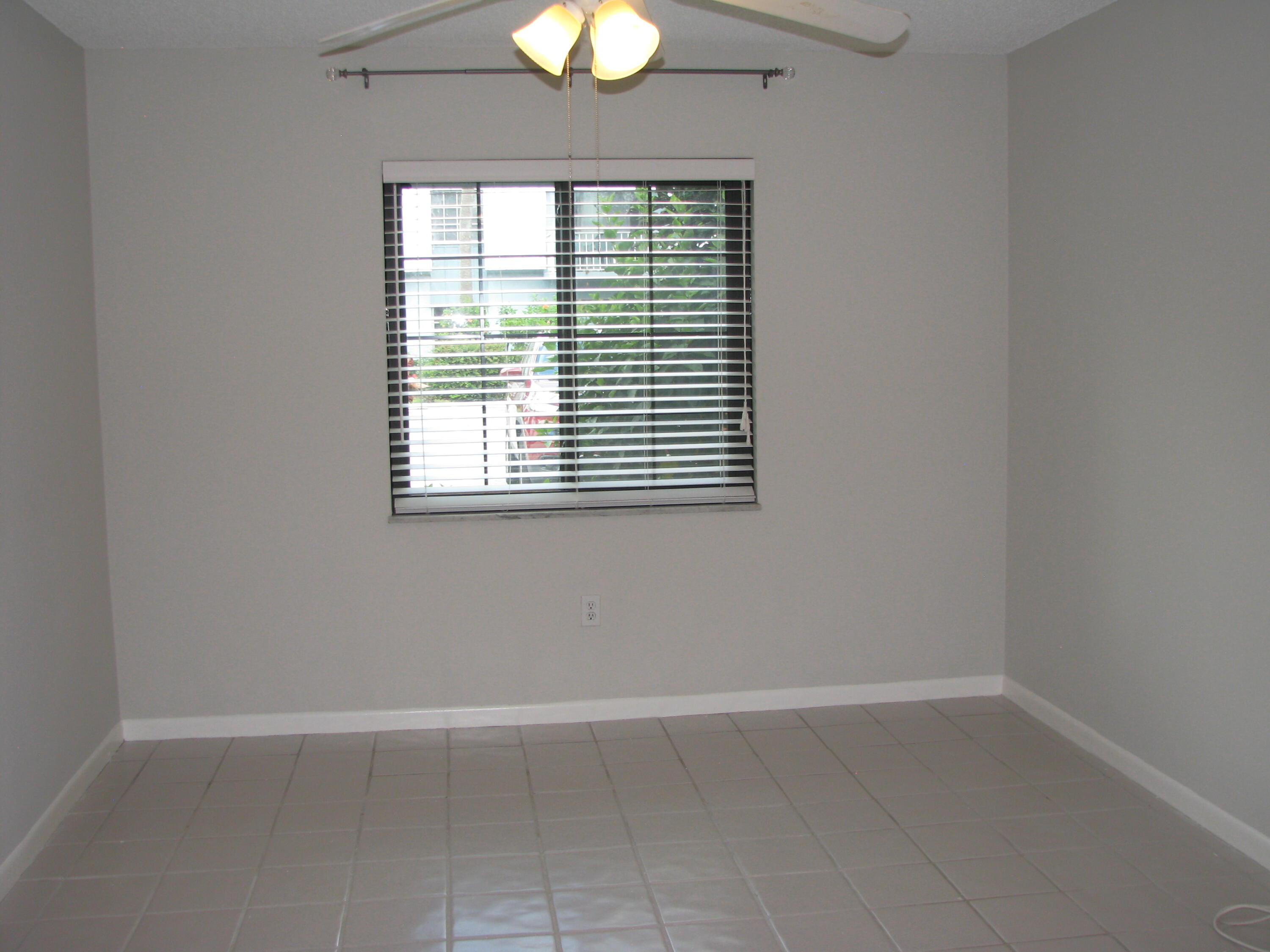 950 South Kanner Highway, Unit D4 Stuart, FL 34994 - Photo 10 of 36 an empty room with a window