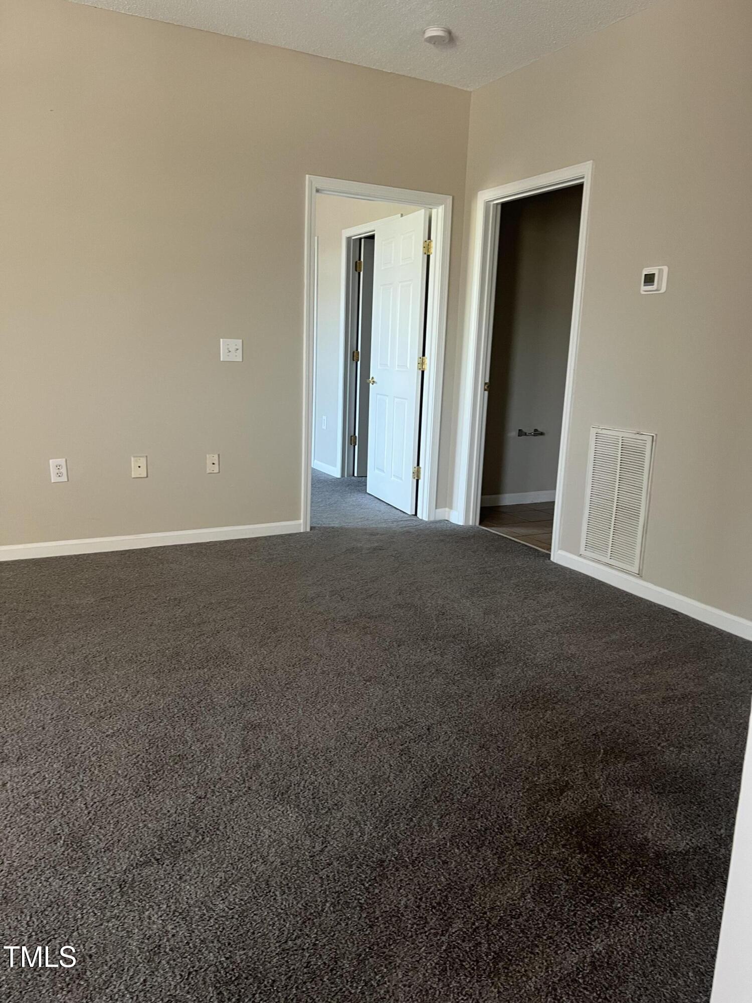 2501 Huntscroft Lane, Unit 200 Raleigh, NC 27617 - Photo 3 of 8 a view of a room with an empty space