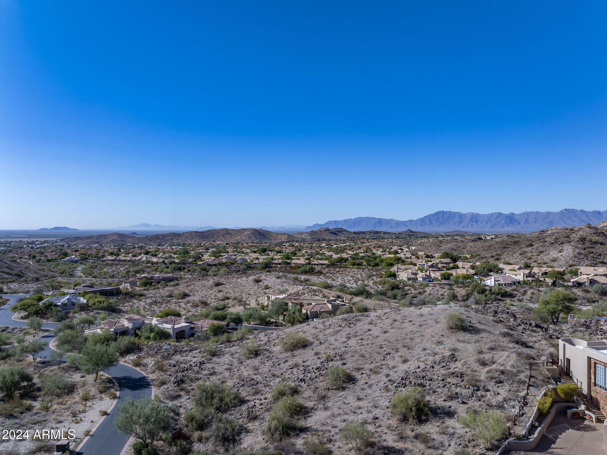 14008 South Rockhill Road, Unit 40 Phoenix, AZ 85048 - Photo 23 of 31 a view of a city with sunset view