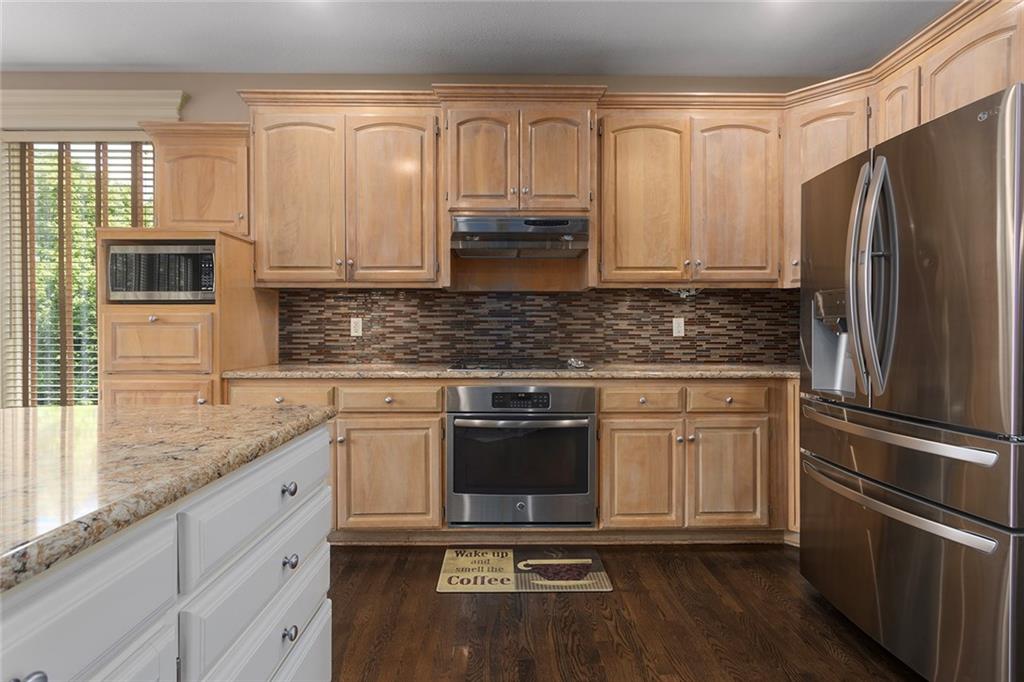 212 Northeast Hidden Ridge Lane Lee's Summit, MO 64064 - Photo 9 of 57