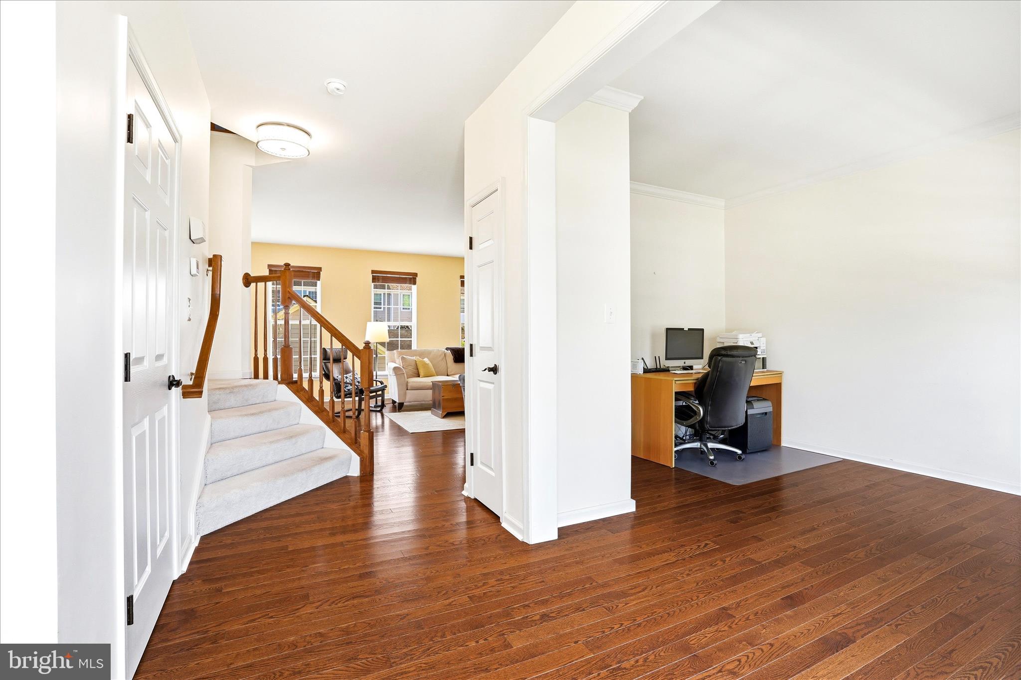 9009 Bealls Farm Road Frederick, MD 21704 - Photo 14 of 41 a view of a livingroom with furniture and a wooden floor