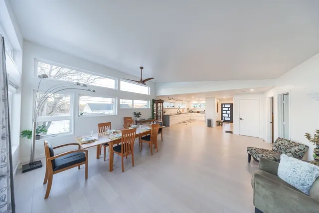 a view of a dining room with furniture window and outside view