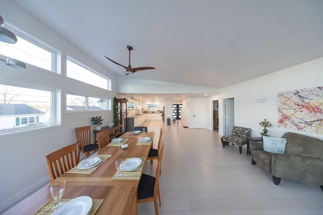 a kitchen with a refrigerator and a sink