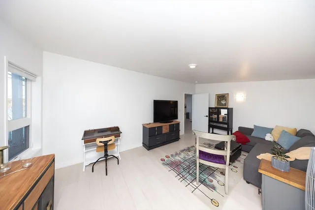a bathroom with a bathtub and a sink