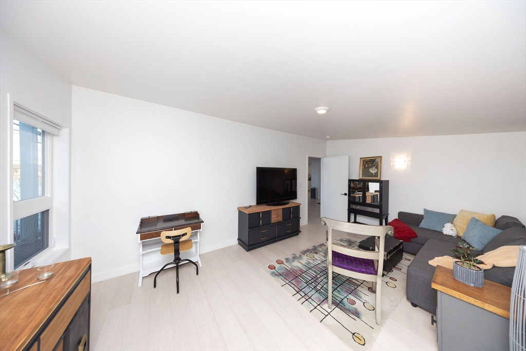 19 Sandy Bar Drive Worcester, MA 01604 - Photo 22 of 42 a living room with furniture and a flat screen tv