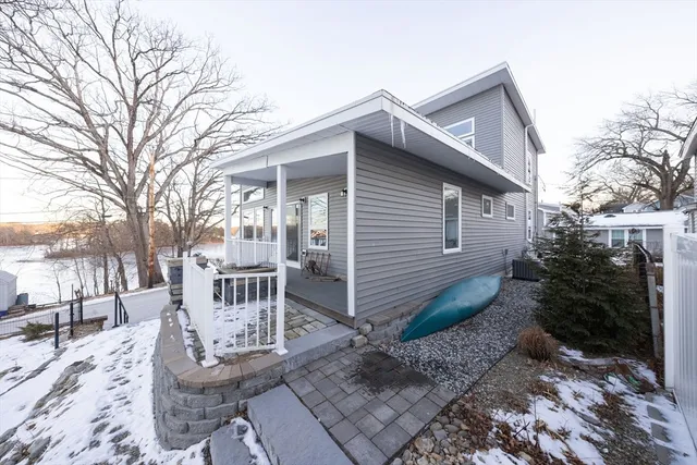 a view of a house with a street