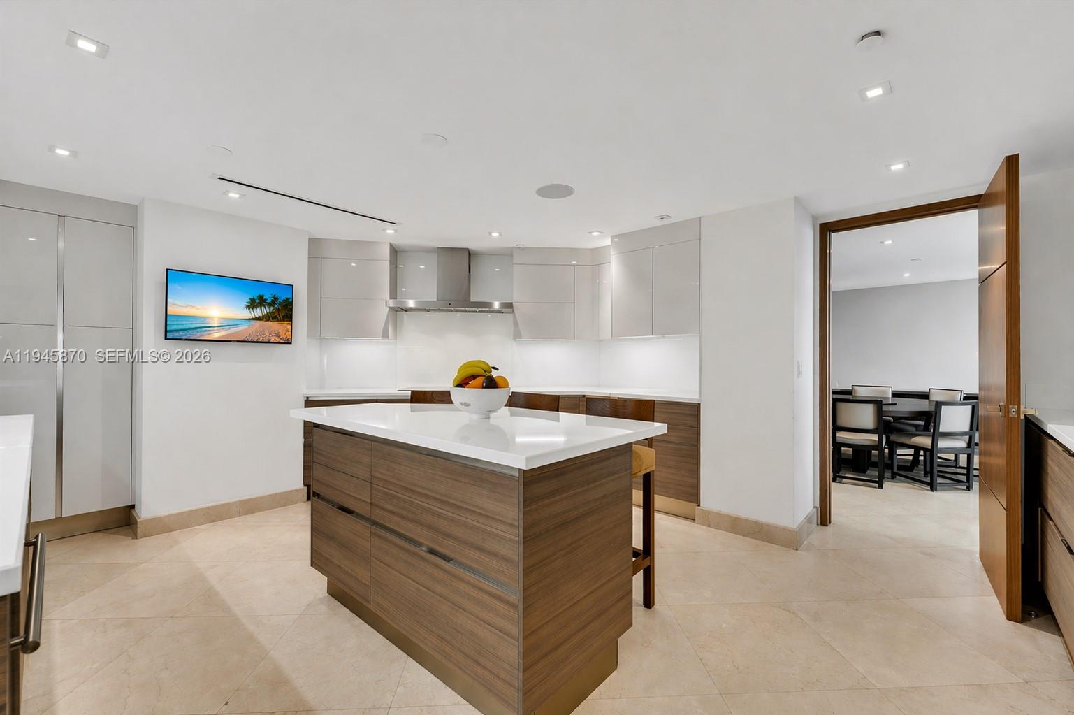 1643 Brickell Avenue, Unit 3904 Miami, FL 33129 - Photo 11 of 26 a kitchen with a stove and a refrigerator