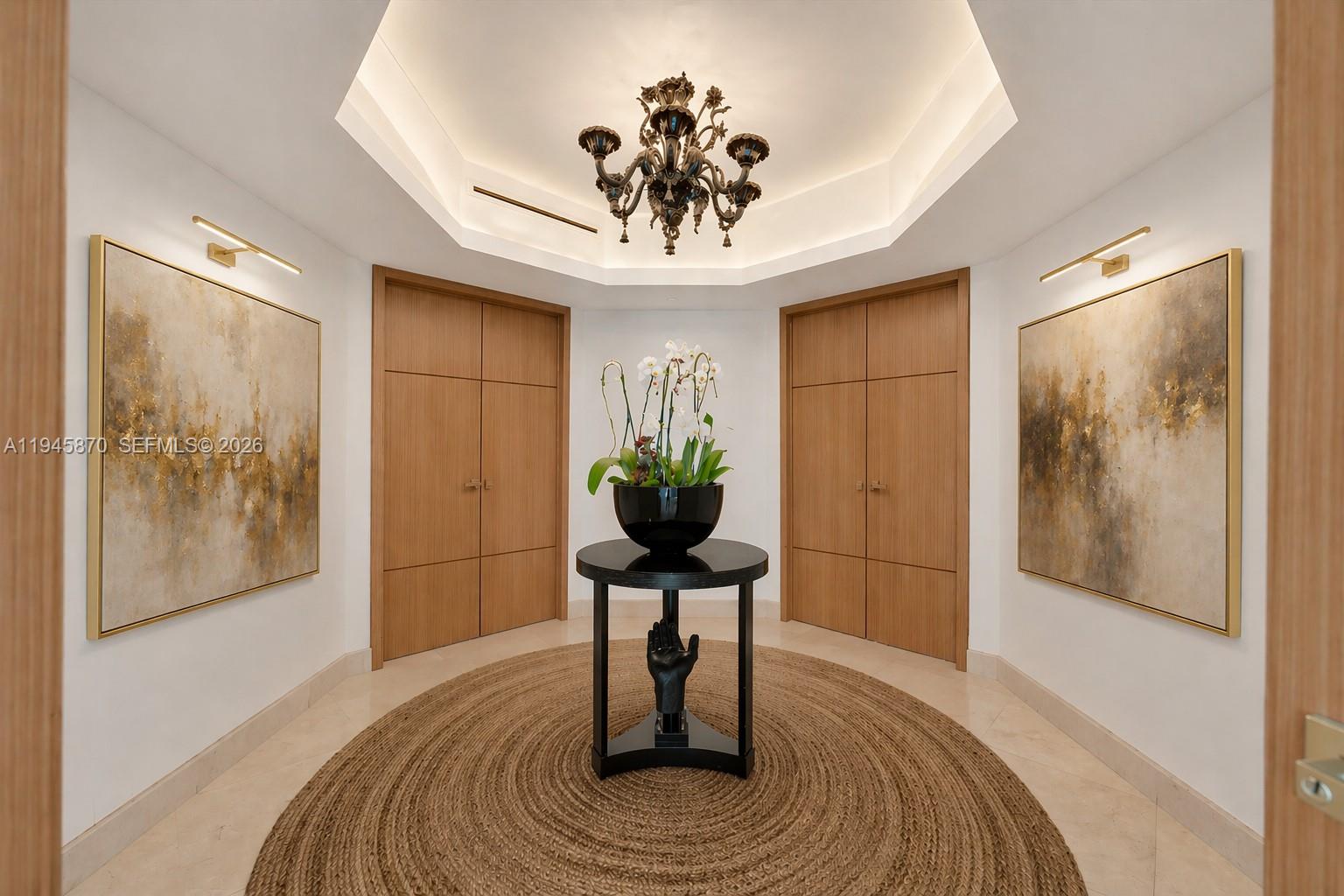 1643 Brickell Avenue, Unit 3904 Miami, FL 33129 - Photo 12 of 26 a vase of flowers sitting on a dining table