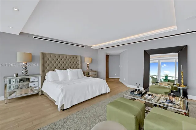 a bedroom with bed and window