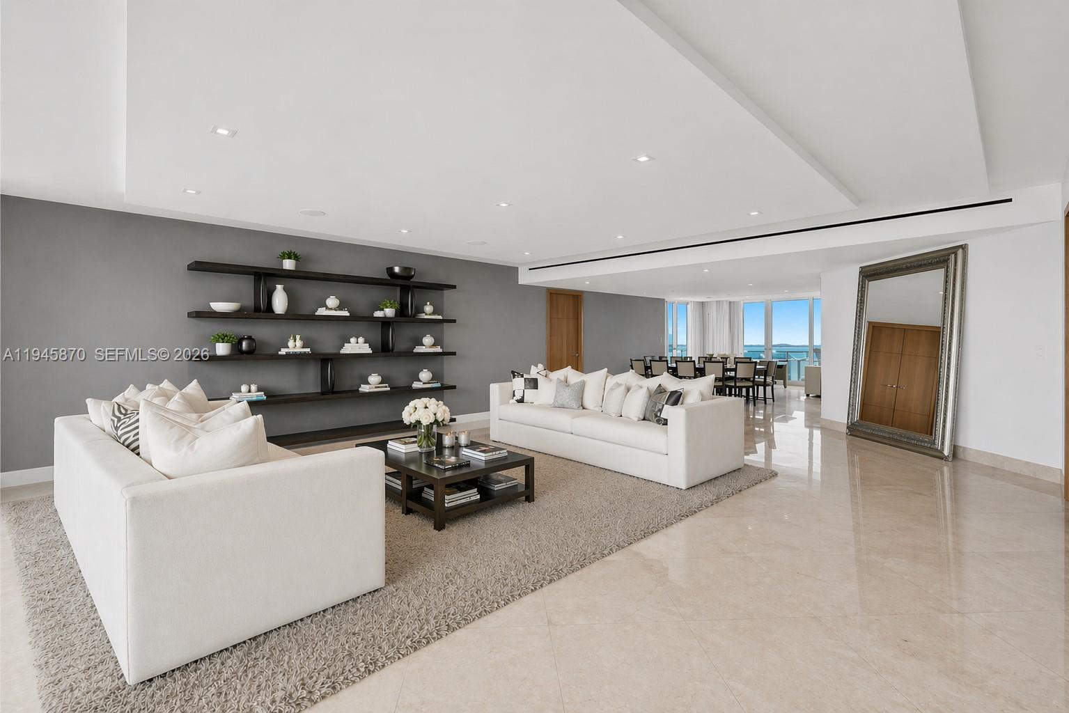 1643 Brickell Avenue, Unit 3904 Miami, FL 33129 - Photo 2 of 26 a living room with furniture and white walls
