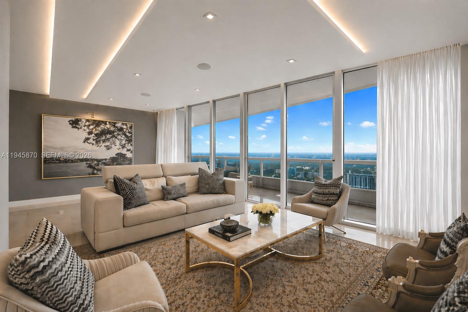 1643 Brickell Avenue, Unit 3904 Miami, FL 33129 - Photo 8 of 26 a living room with furniture and a large window