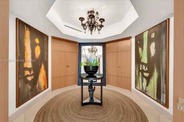 a view of a livingroom with furniture window and wooden floor