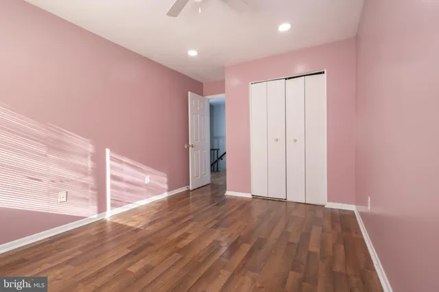 a view of a livingroom with wooden floor