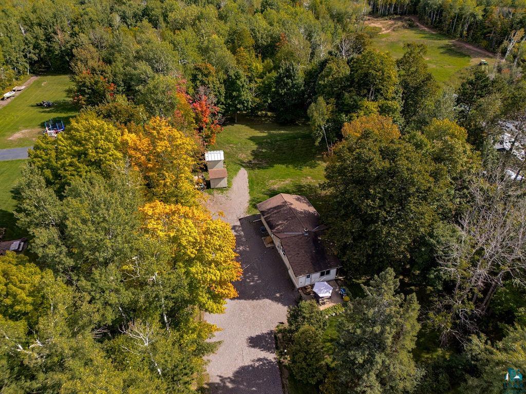 5466 Jean Duluth Road Duluth, MN 55803 - Photo 29 of 34 Expansive property featuring a gravel driveway, mature trees, and a secluded setting