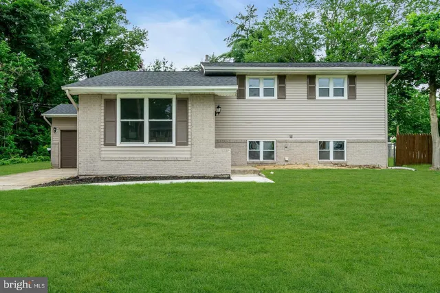 a view of outdoor space yard and front view of a house