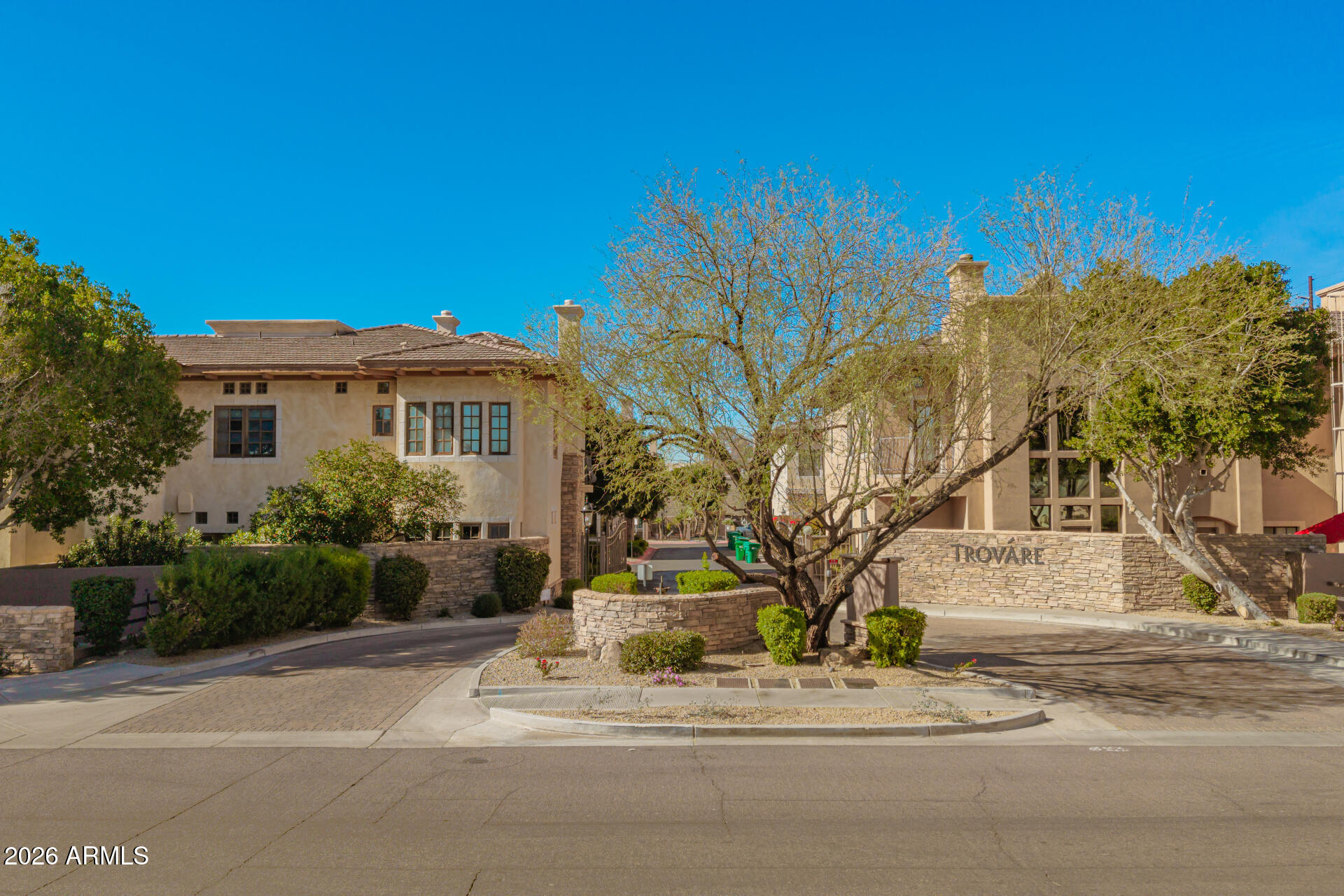 4430 North 22nd Street, Unit 3 Phoenix, AZ 85016 - Photo 1 of 68 a view of a white house next to a road and yard