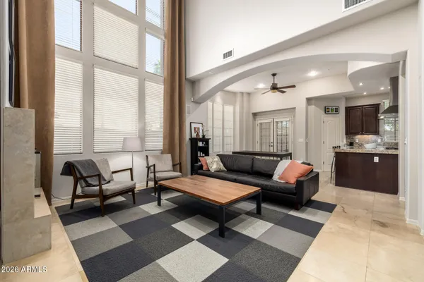 a view of bathroom with a shower and a toilet